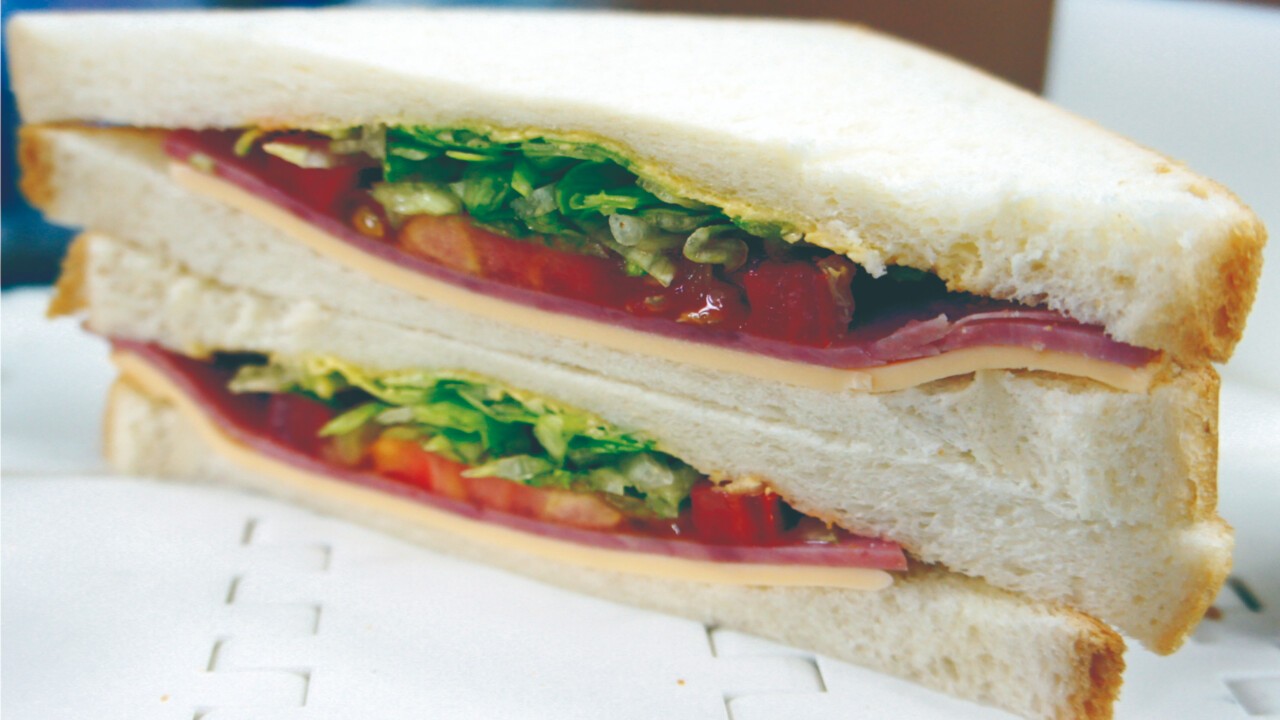 Cut sample: cold sandwich with toast, vegetables and cheese
