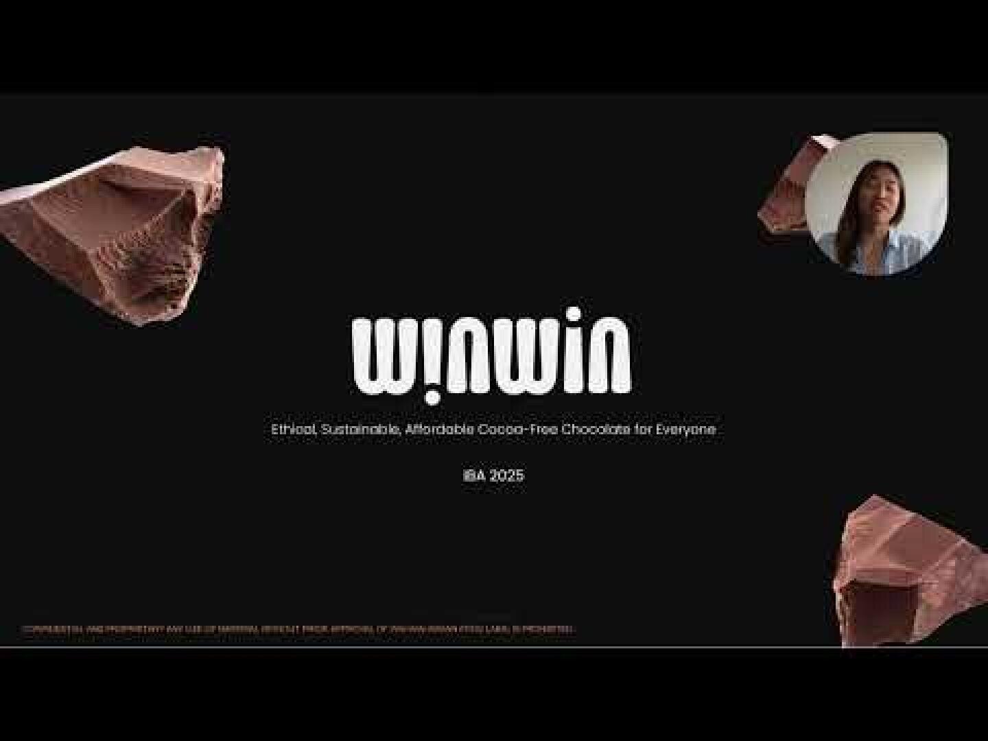 A presentation slide with the title winwin and the tagline Ethical, Sustainable, Affordable Cocoa-Free Chocolate for Everyone. There are chocolate pieces, a small video of a woman speaking, and the text IBA 2025 on a black background.