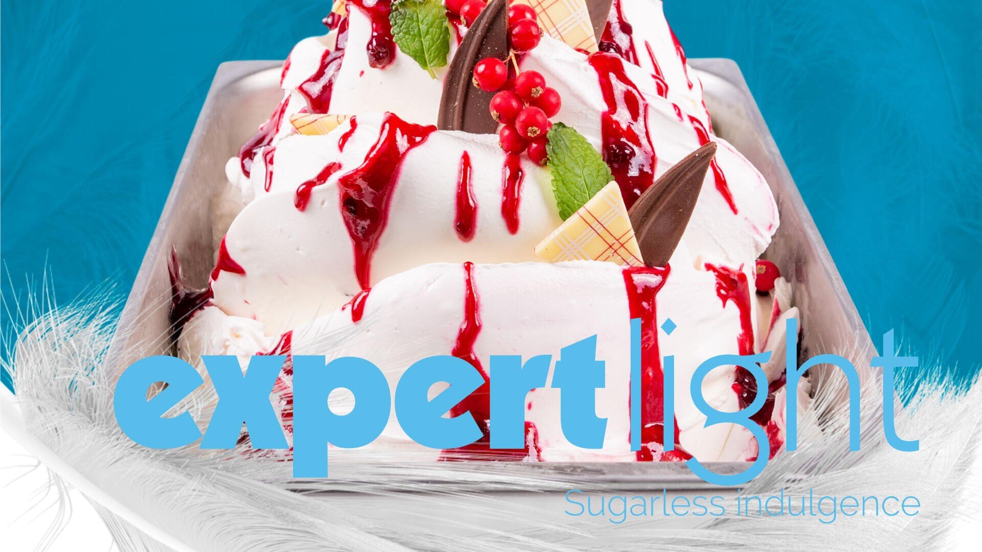 A tray of whipped cream dessert topped with red syrup, chocolate pieces, red berries, and mint, with the words expert light and Sugarless indulgence overlaid on the image.