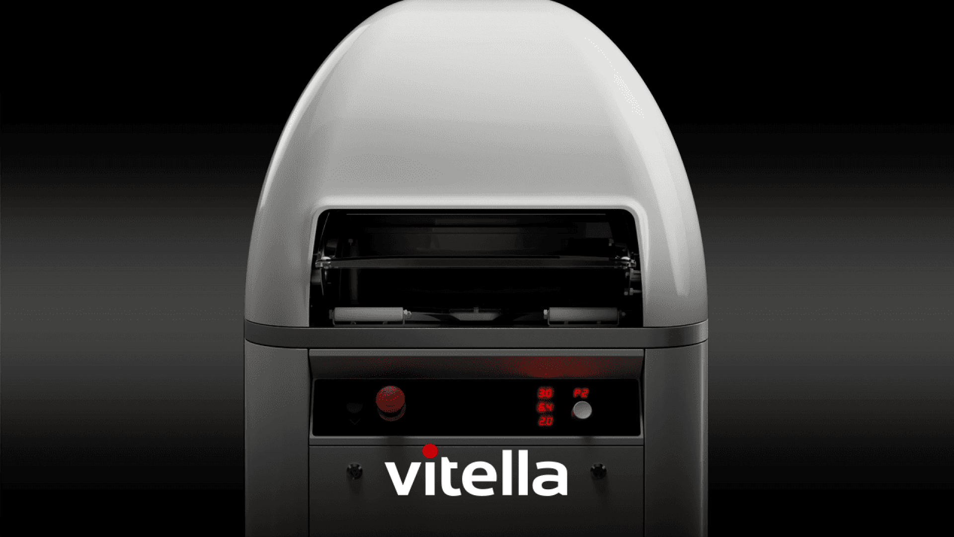 A modern, gray industrial machine with a semi-domed top, digital display, and control buttons. The brand name “vitella” is prominently displayed in white and red on the front.