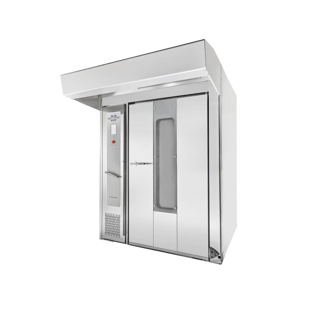 Stainless steel commercial bakery oven with a large front door, vertical handle, control panel on the left, and a ventilation hood on top, isolated on a white background.