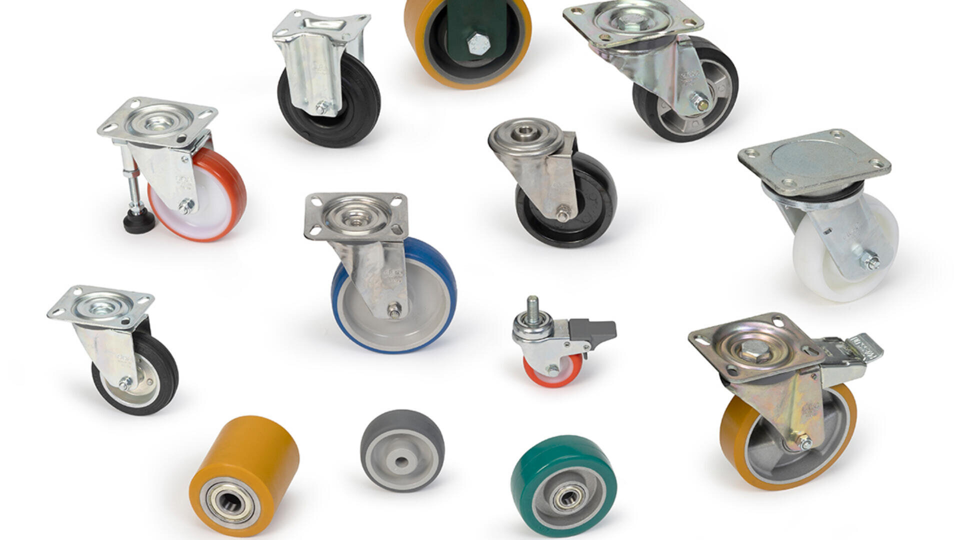 A variety of caster wheels and rollers in different sizes, colors, and materials are arranged on a white background. Some have metal mounting plates, while others are standalone wheels.