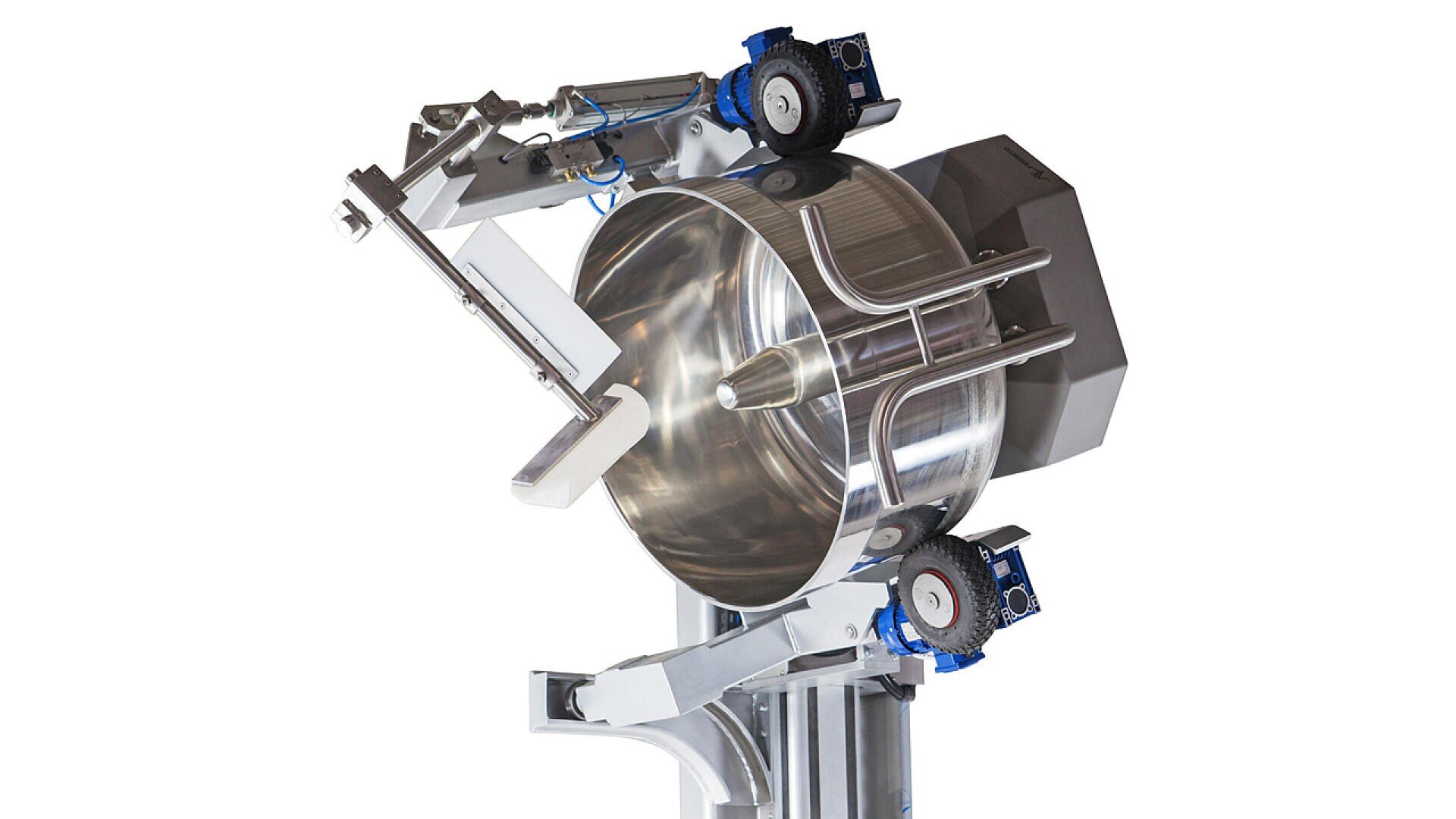 A large, industrial stainless steel mixing or processing machine with mechanical arms and wheels, designed for automation in food or pharmaceutical production. The machine is clean and highly reflective.