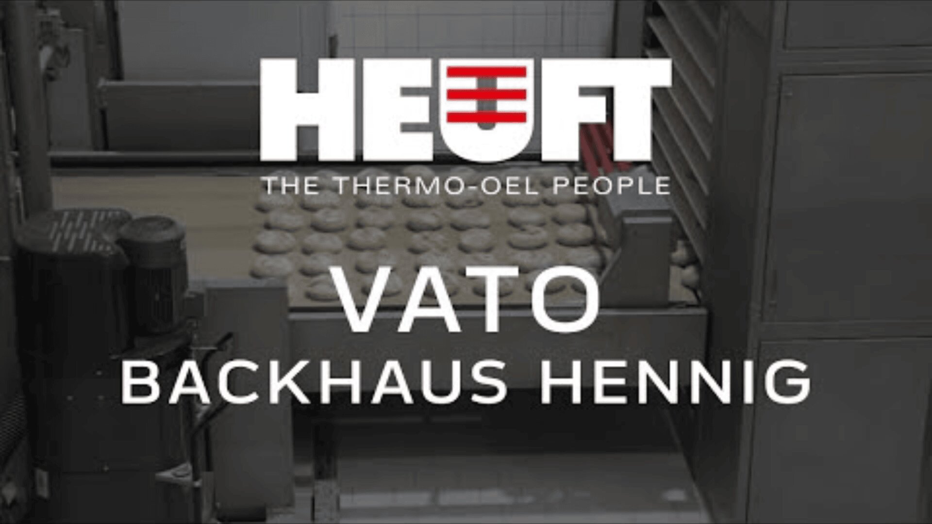 Rows of dough pieces move on a conveyor belt in an industrial bakery. Overlaid text reads: HEUFT THE THERMO-OEL PEOPLE, VATO BACKHAUS HENNIG.