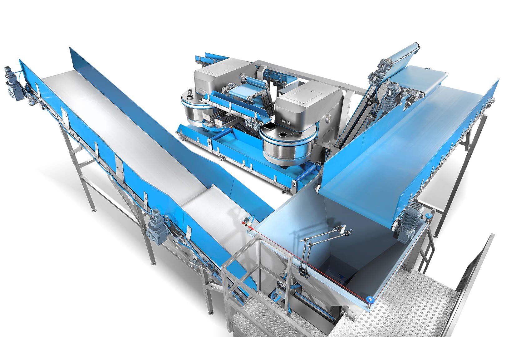 A large industrial food processing machine with multiple blue and silver conveyor belts, metal components, and platforms, designed for automated sorting or handling of products in a factory setting.