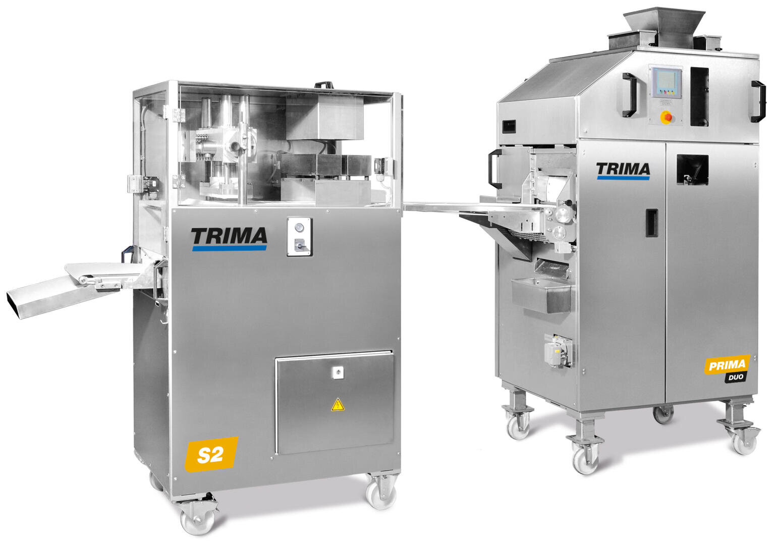 Two industrial stainless steel bread processing machines on wheels labeled TRIMA. The left machine is labeled S2, and the right machine is labeled PRIMA DUO. Both have control panels and conveyor parts.