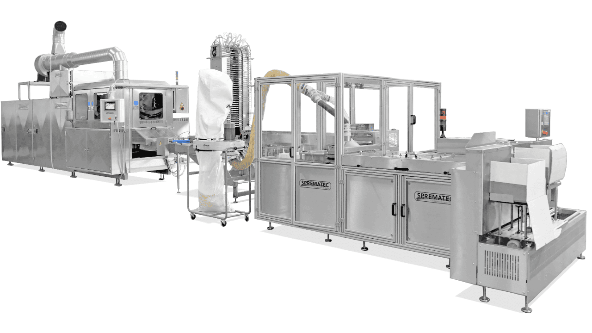 A large, industrial food processing machine made of stainless steel with multiple compartments, clear panels, and attached pipes, set against a white background. The machine is labeled SPEMAKAT.