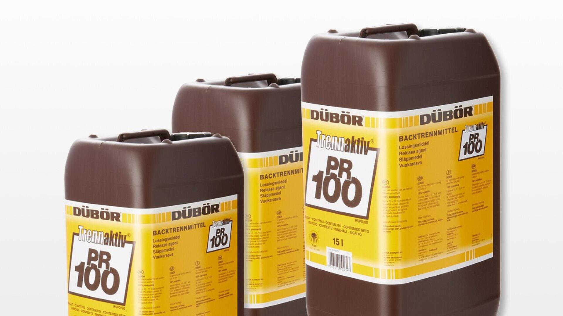 Three large brown plastic containers with yellow and white labels displaying the text “DÜBÖR PR 100” and product information in German. The containers are placed on a white background.