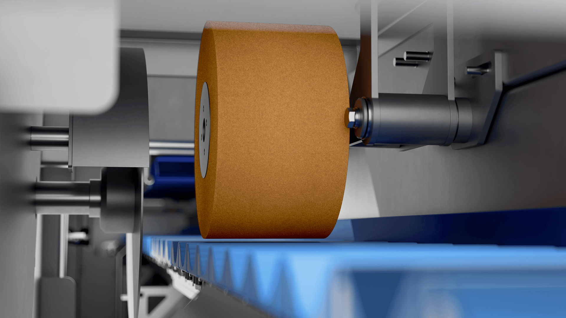 Close-up view of a large brown industrial roller pressing onto a conveyor belt inside a machine, with metallic components and a blue belt visible in the foreground.