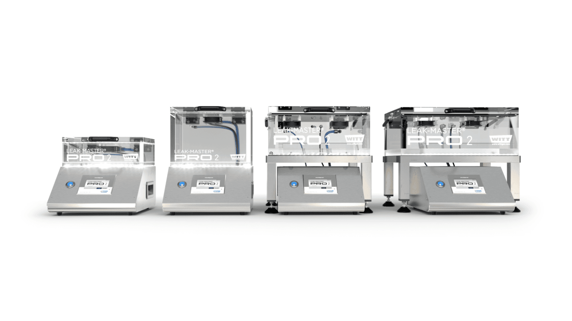 Four stainless steel industrial leak testing machines, labeled “LEAK-MASTER PRO 2,” are lined up side by side on a white background. Each machine has a digital display and transparent upper compartments.