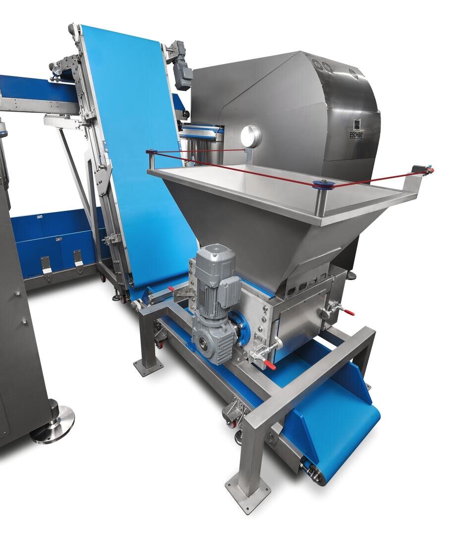 A stainless steel industrial food processing machine with blue conveyor belts, a large metal hopper, and a cylindrical drum, designed for automated ingredient sorting or handling.