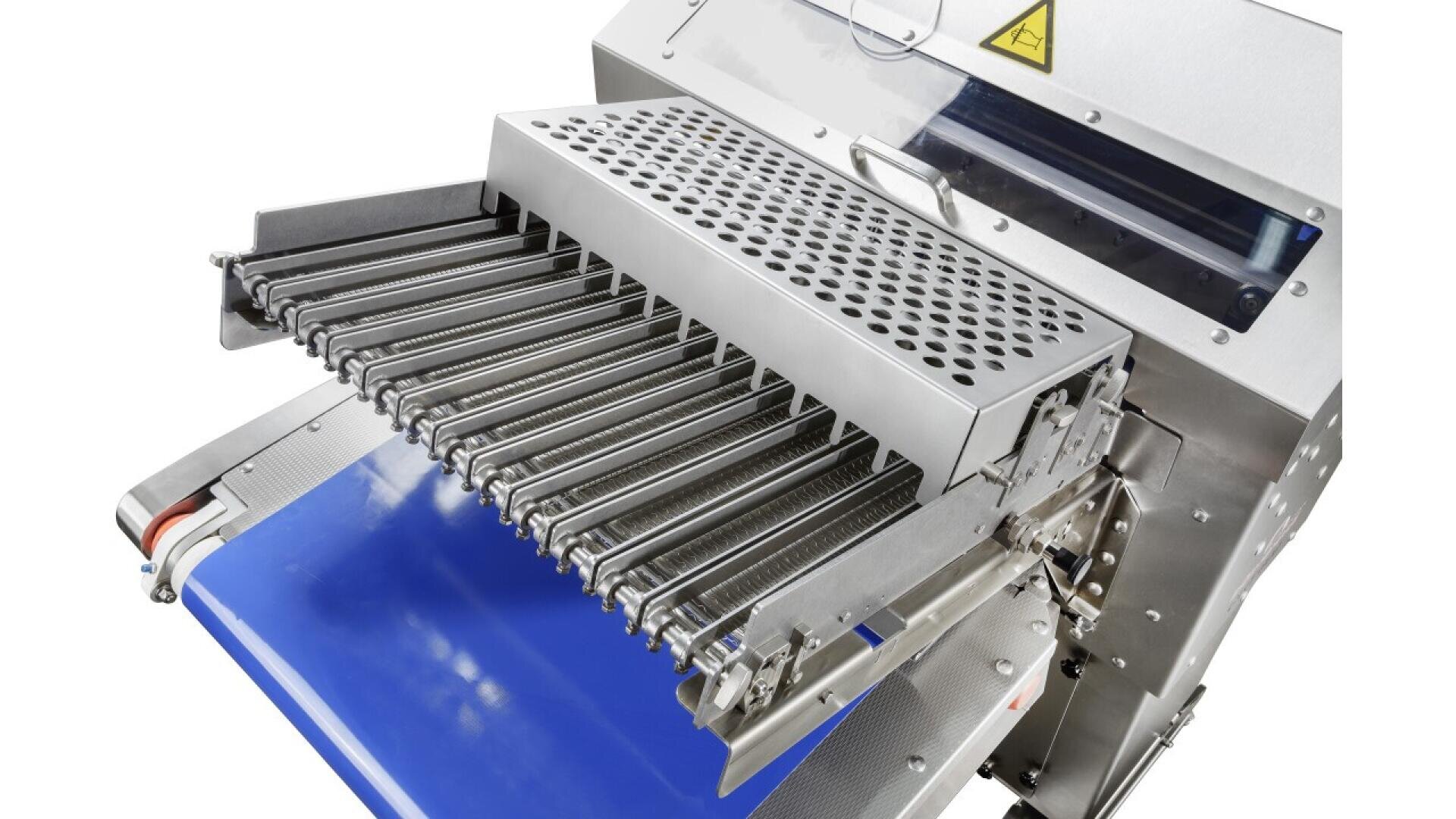 Close-up view of an industrial stainless steel food processing machine with multiple rollers and a blue conveyor belt, designed for automated handling or preparation of food products.