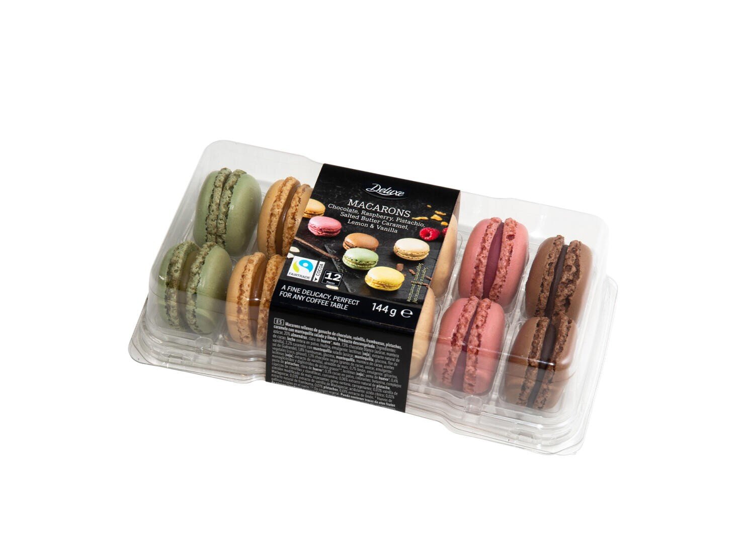 A clear plastic container holds 12 assorted macarons in green, brown, pink, and chocolate colors, with a black label on top displaying product information and images of macarons.