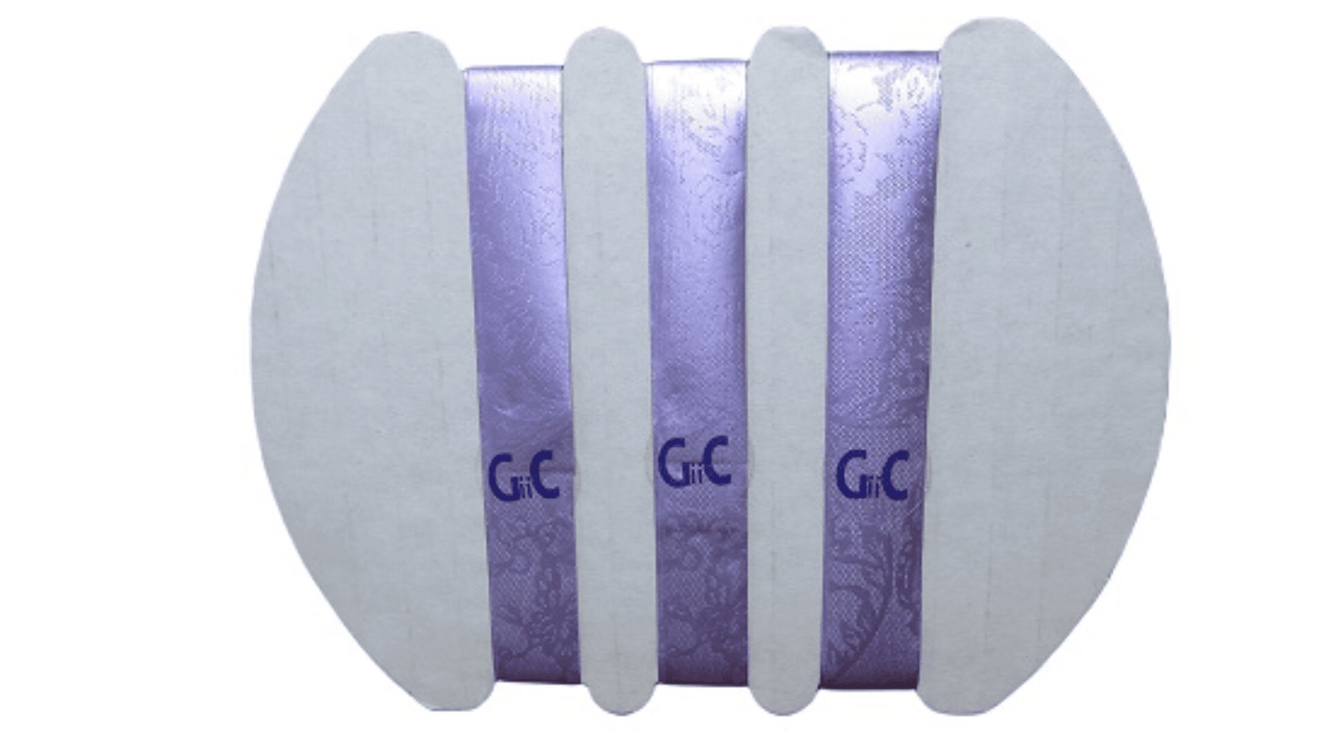 Four rectangular cardboard strips and two semicircular cardboard pieces frame three partially visible purple soap bars with a floral pattern and the letters G.C on them.