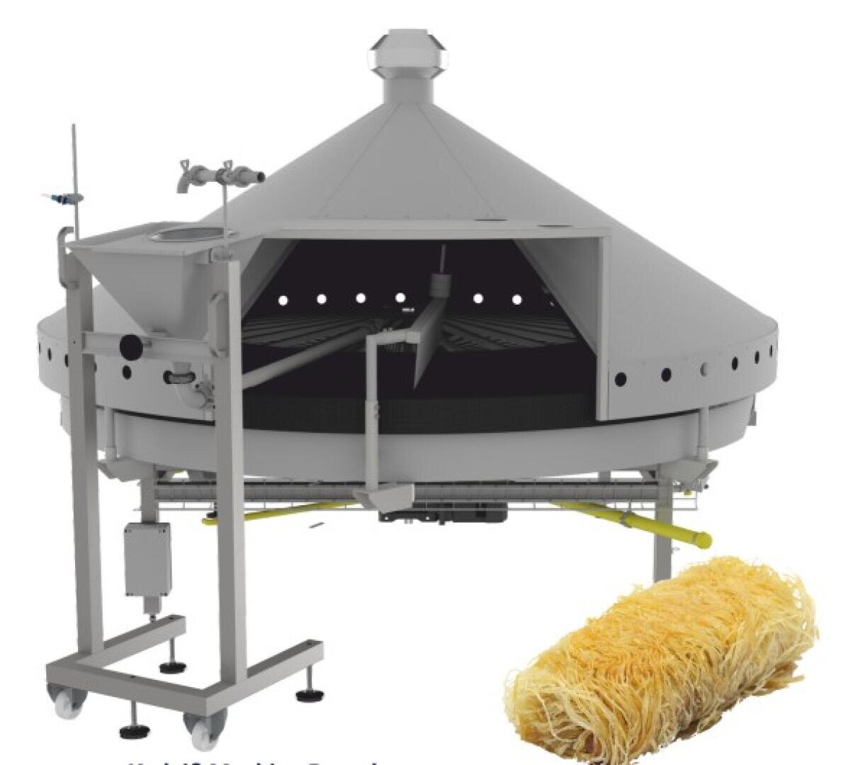 A large, round, industrial food processing machine with an open front and a vented conical top, shown next to a bundle of thin, yellow, noodle-like food product.