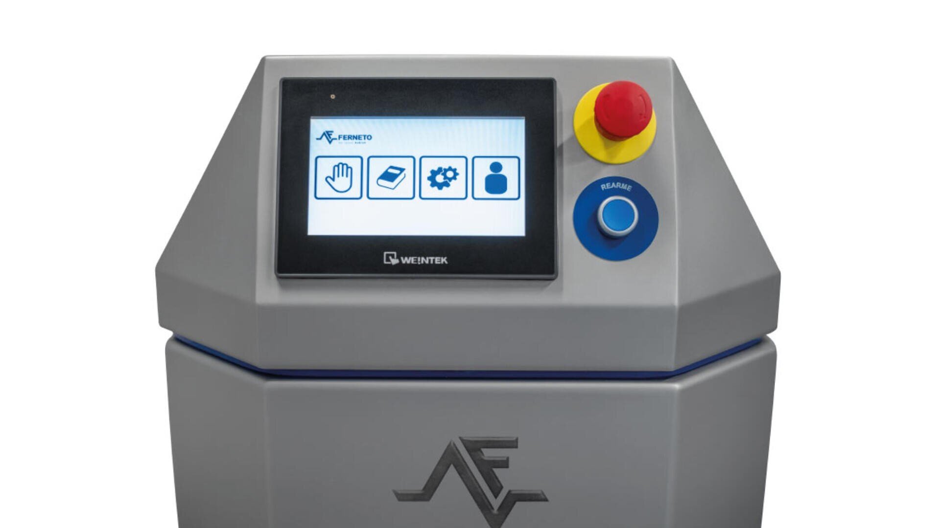 A close-up of an industrial machine control panel with a touchscreen displaying icons, a yellow button, a large red emergency stop button, and a blue rotary switch. The machine features a visible company logo below the screen.