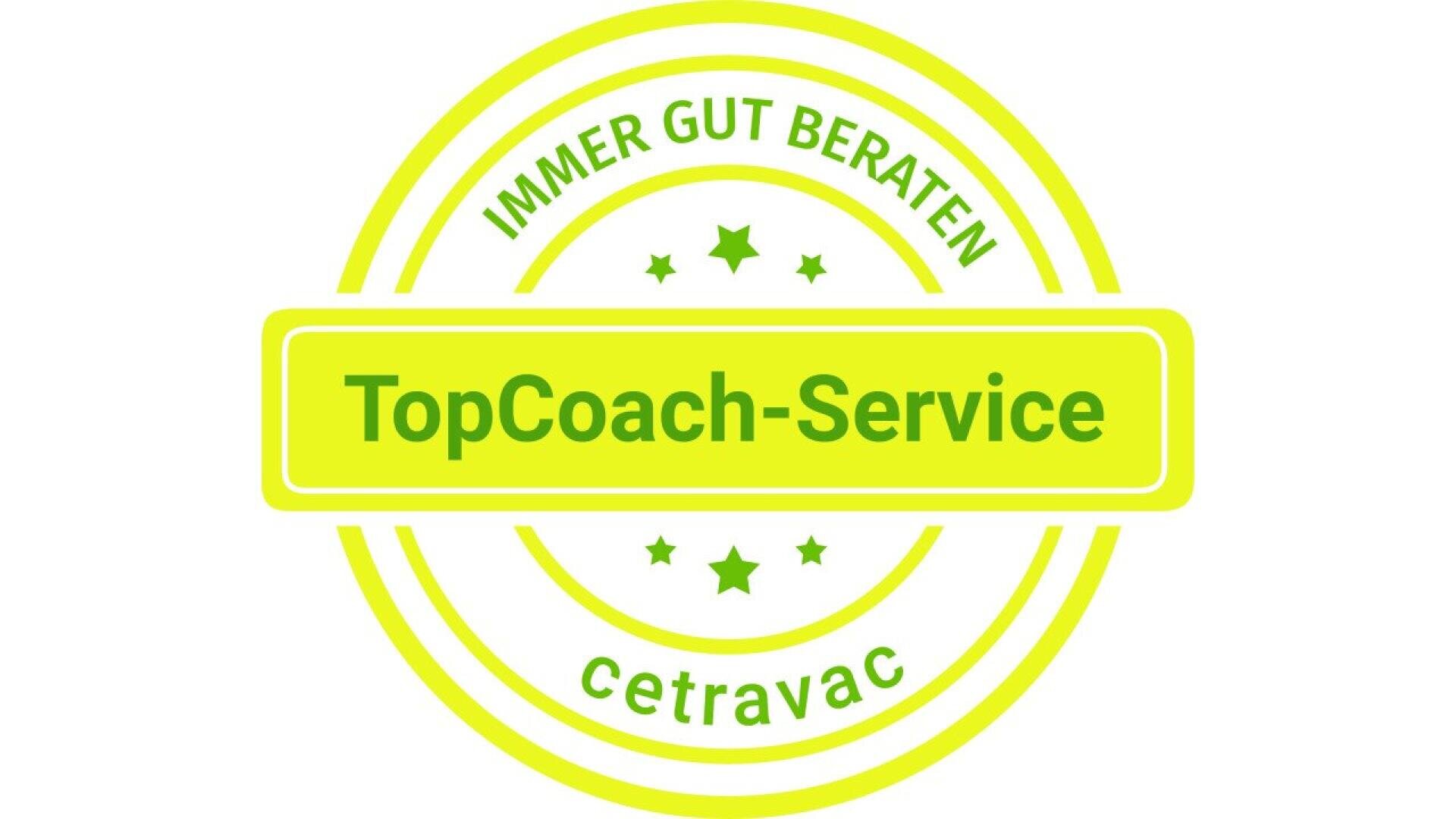 A bright yellow and green circular badge with the words “TopCoach-Service” in the center, “IMMER GUT BERATEN” above, and “cetravac” below, surrounded by small stars.