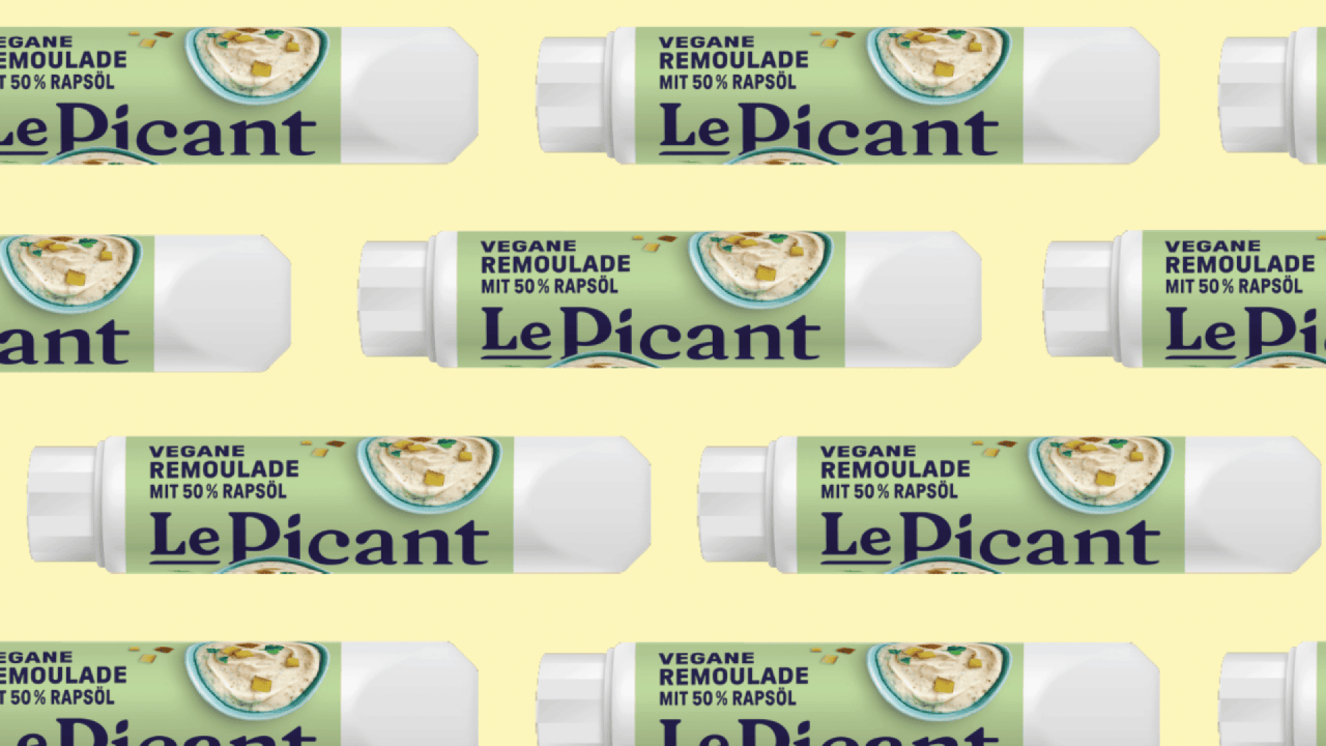 Tubes of Le Picant vegane Remoulade with 50% rapeseed oil are arranged in a repeating pattern on a light yellow background. The label features an image of creamy remoulade and herbs.