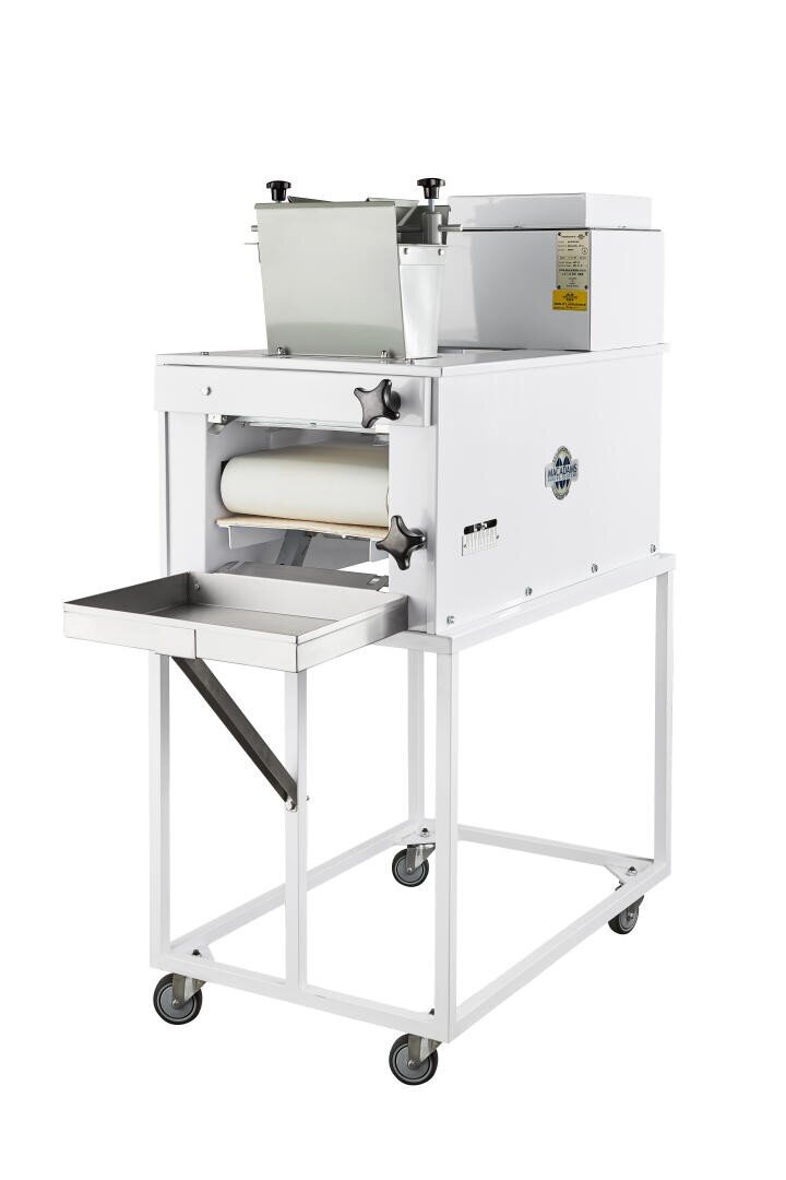 A large, white, commercial dough sheeter with a metal tray and rollers mounted on a metal frame with wheels for mobility. The machine is designed for rolling out dough in bakeries or in food production.