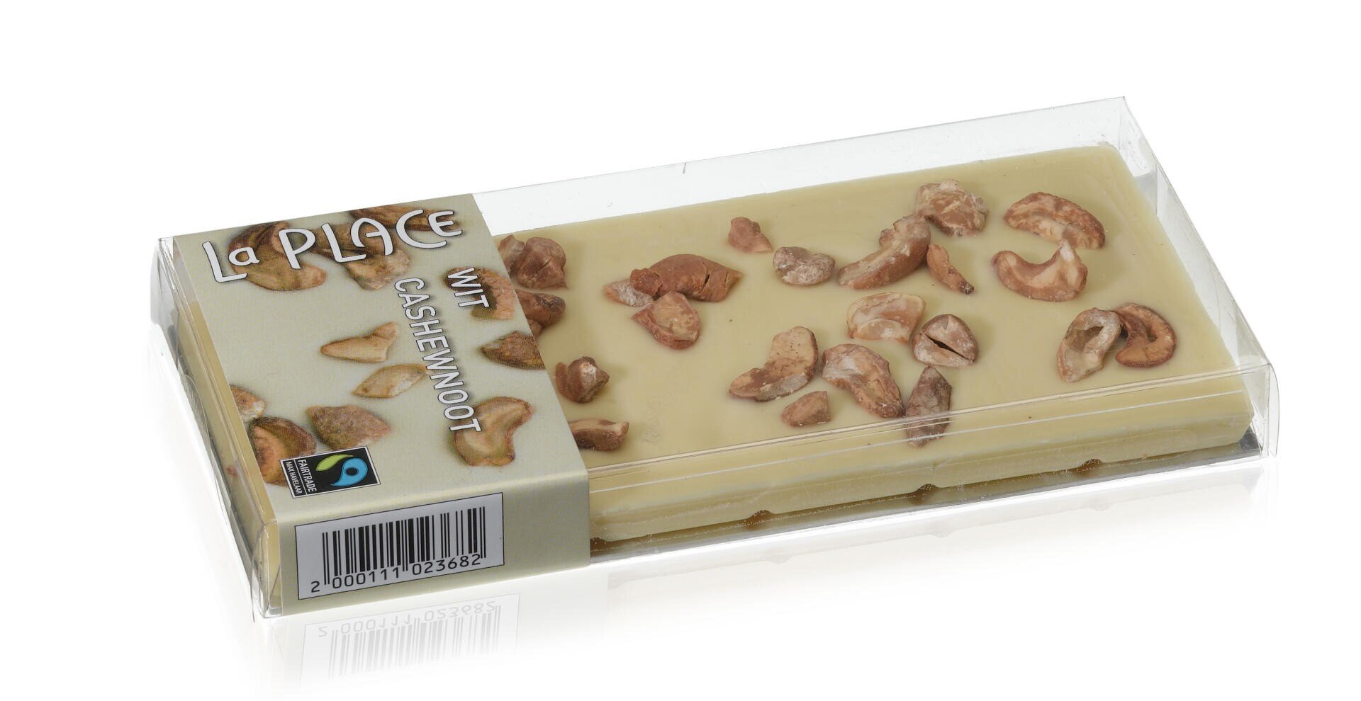 A clear plastic box containing a white chocolate bar topped with cashew nuts. The label reads La Place Wit Cashewnoot and features Fairtrade and barcode symbols.