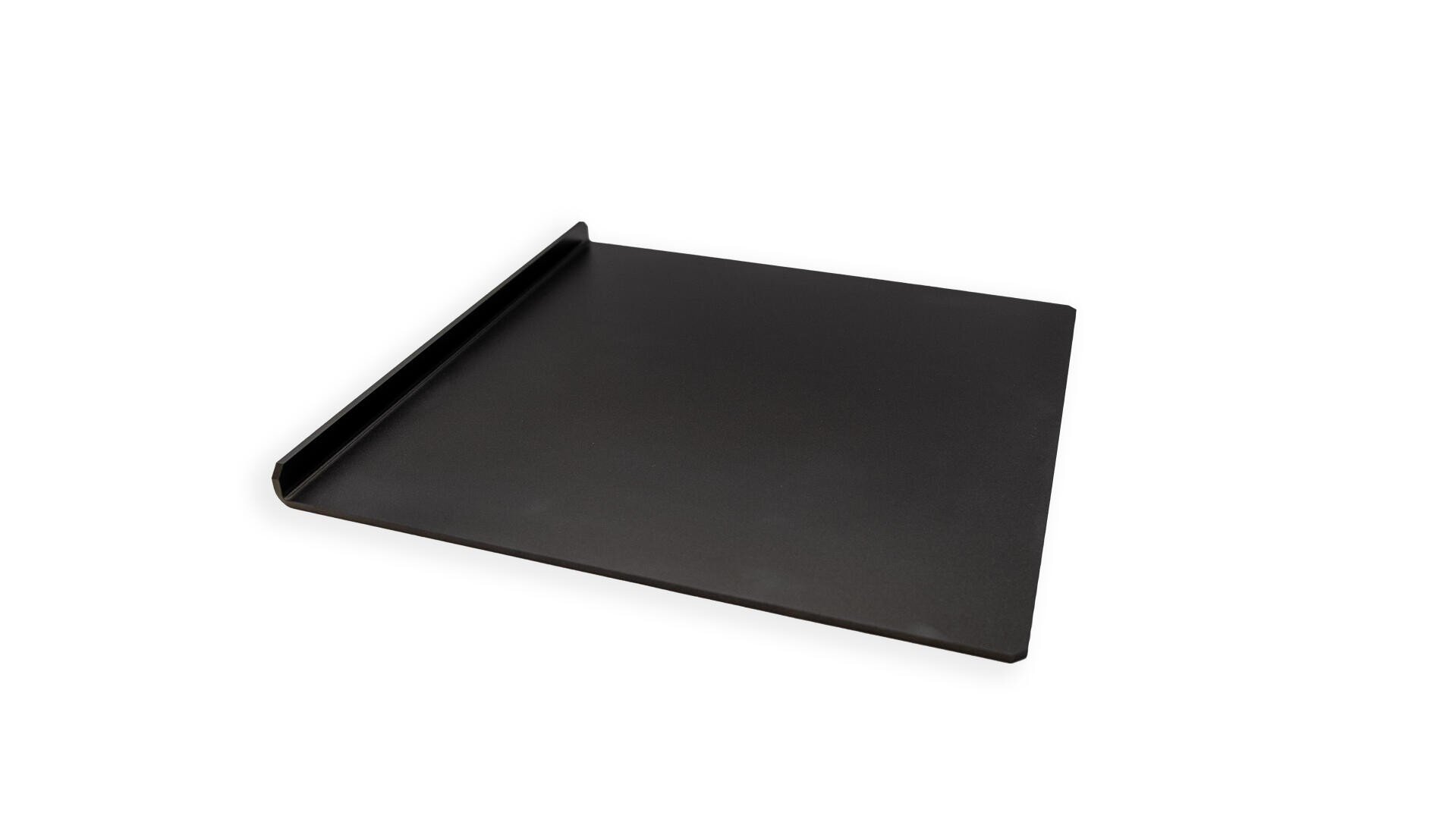 A black, rectangular metal baking sheet with a raised edge on one side, shown on a white background.