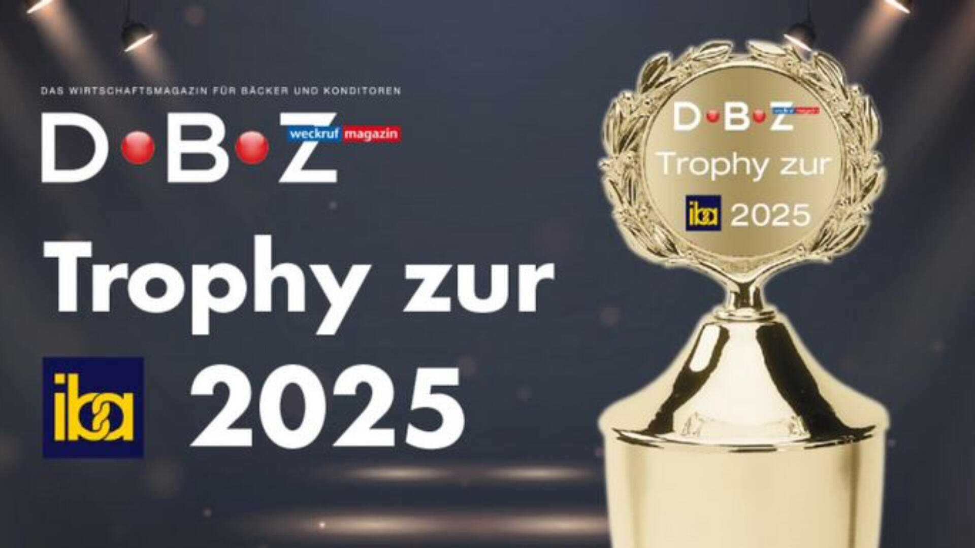 Eine goldene Trophäe mit dem Text D B Z Trophy zur 2025 und dem iba-Logo vor einem dunklen Hintergrund. Der Schriftzug "Trophy zur 2025" erscheint deutlich sichtbar auf der linken Seite.