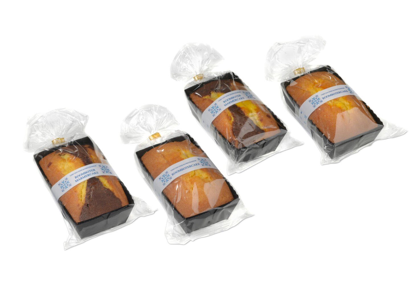 Four rectangular loaves of cake, each in a black tray and wrapped in clear plastic with a white and blue label, are arranged on a white background.