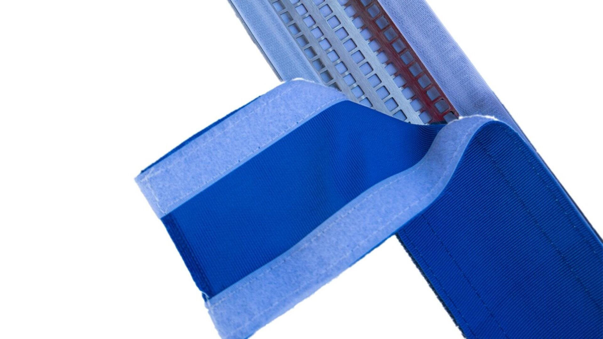 Close-up of a blue fabric strap with a Velcro fastener, partially open, showing the hook and loop surfaces, against a white background.