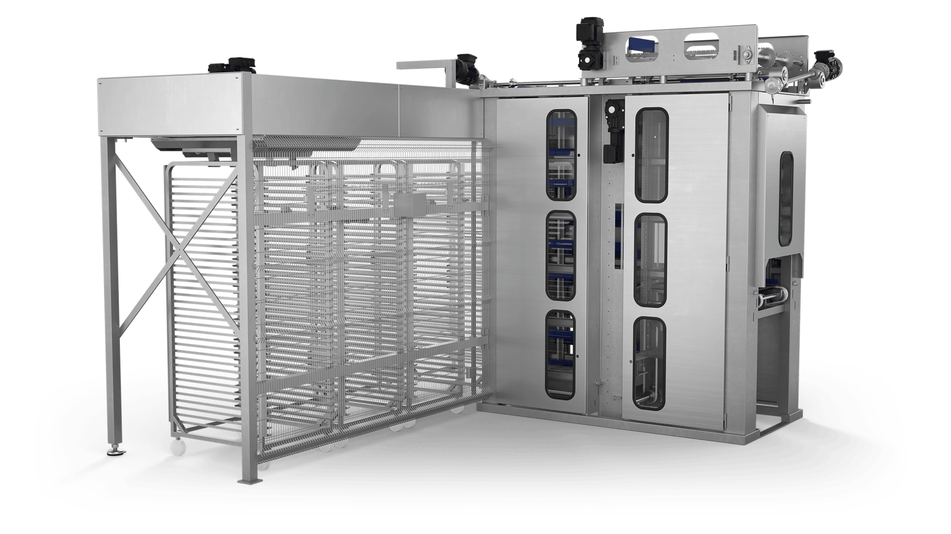 A large stainless steel industrial machine with vertical and horizontal bars, a glass panel section, and various mechanical components, likely used for automated processing or manufacturing in a factory setting.