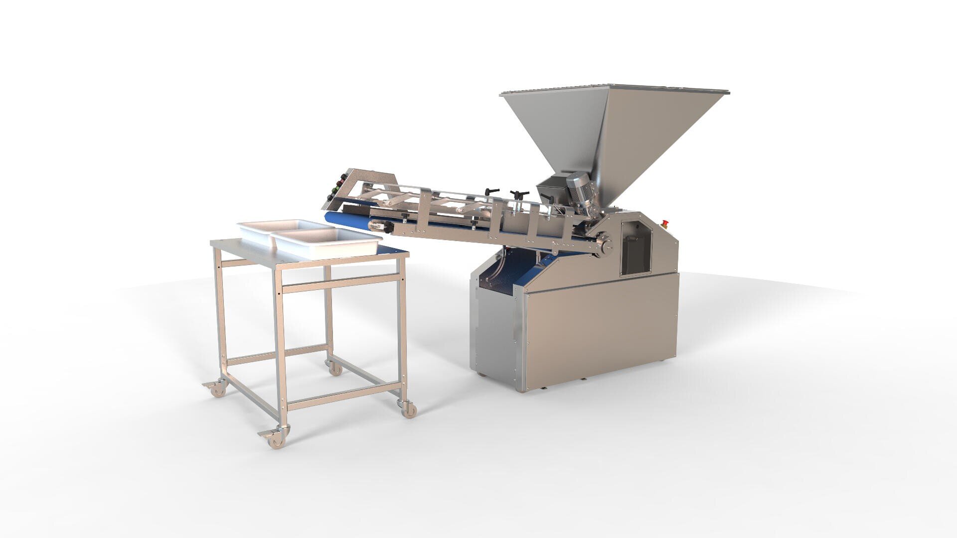 A stainless steel industrial food processing machine with a large hopper, conveyor belt, and a metal frame table on wheels for tray placement, set against a plain white background.