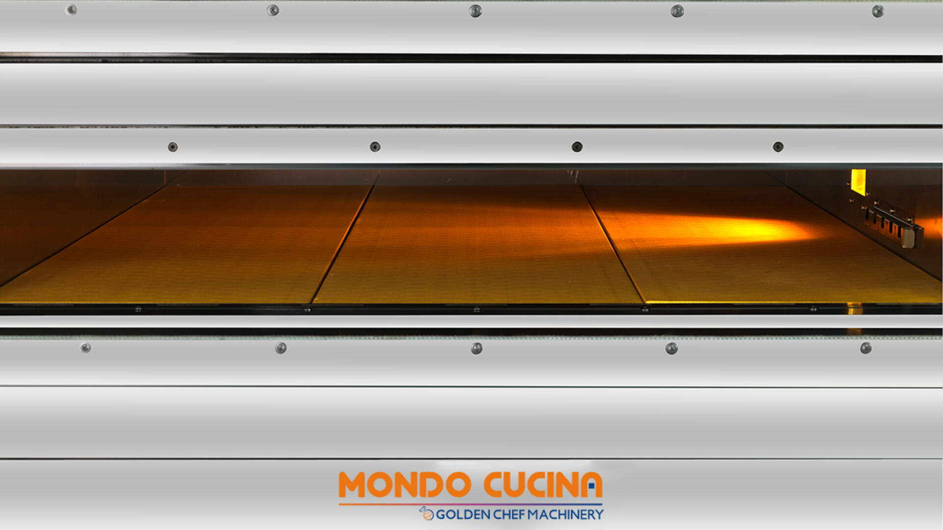 A commercial baking oven with a lit interior and metal trays, viewed through a horizontal window. The logo MONDO CUCINA Golden Chef Machinery is displayed at the bottom.