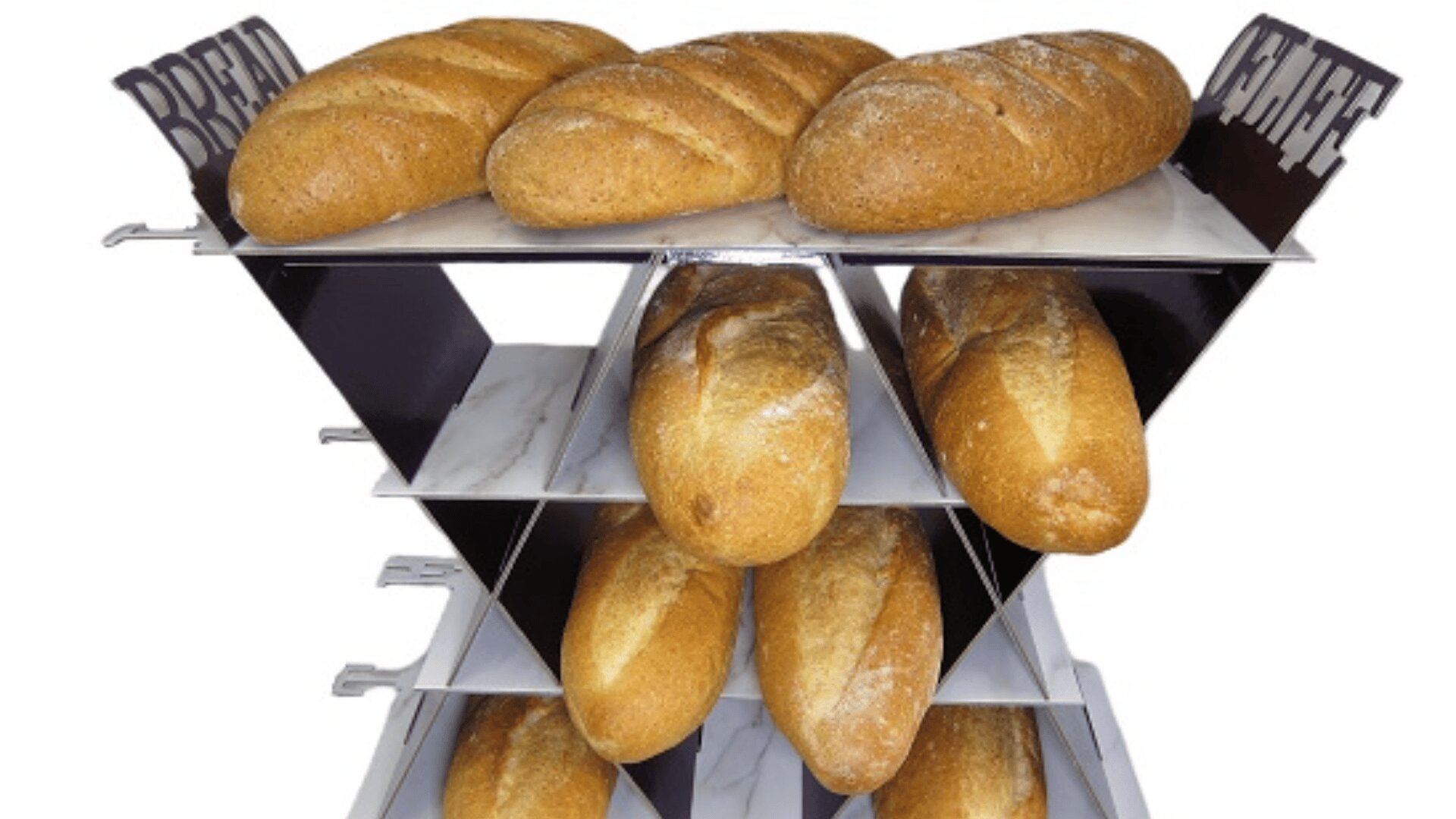 A display rack holds multiple loaves of bread on angled shelves, with signs reading “BREAD” and “CAKE” on each end. The bread is golden brown and arranged neatly in rows.