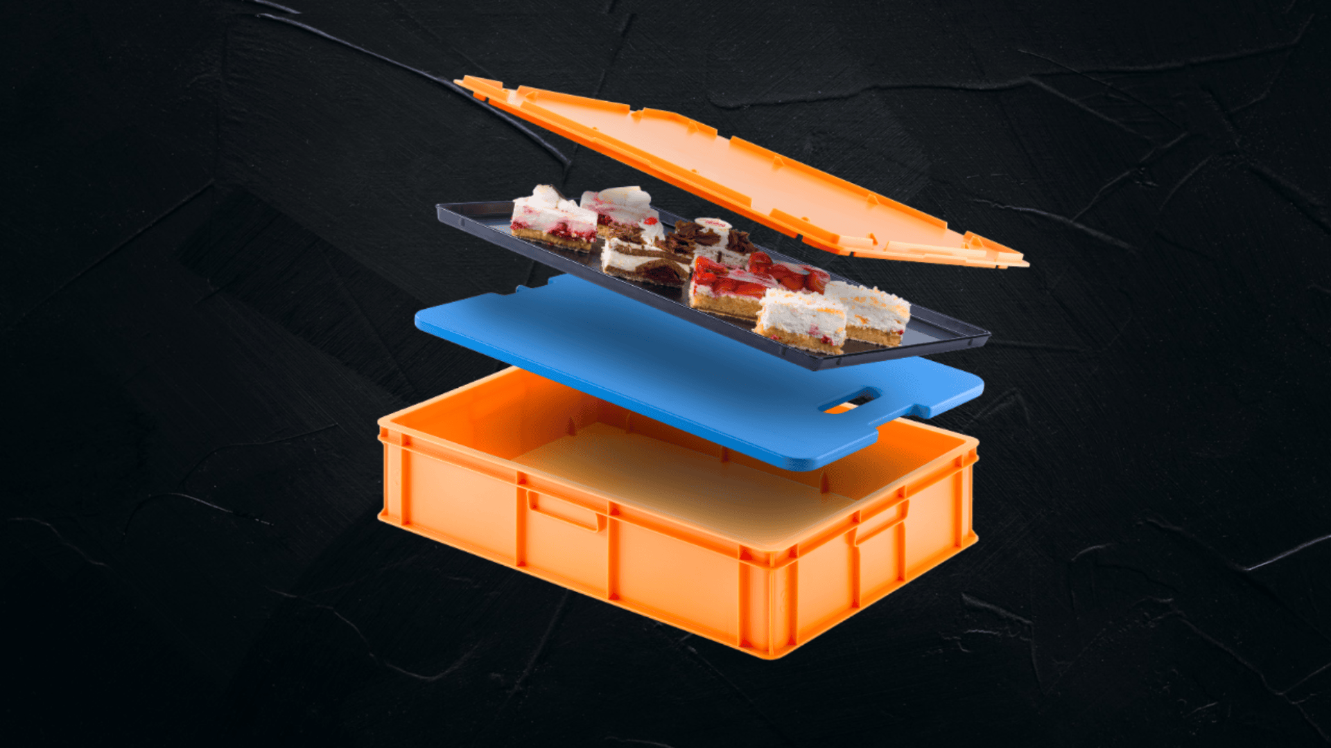Ein orangefarbener Kunststoffbehälter mit einem blauen Tablett im Inneren, der verschiedene Dessertriegel enthält, ist mit teilweise geöffnetem Deckel vor einem dunklen Hintergrund abgebildet.