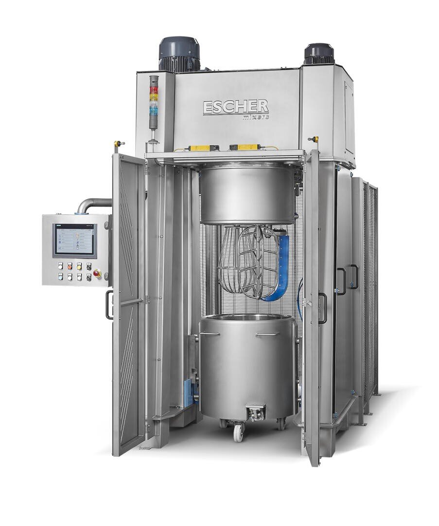 A large industrial stainless steel dough mixer with open front doors, control panel on the left, and mixing bowl inside. The machine is labeled ESCHER, and has ventilation units on top.