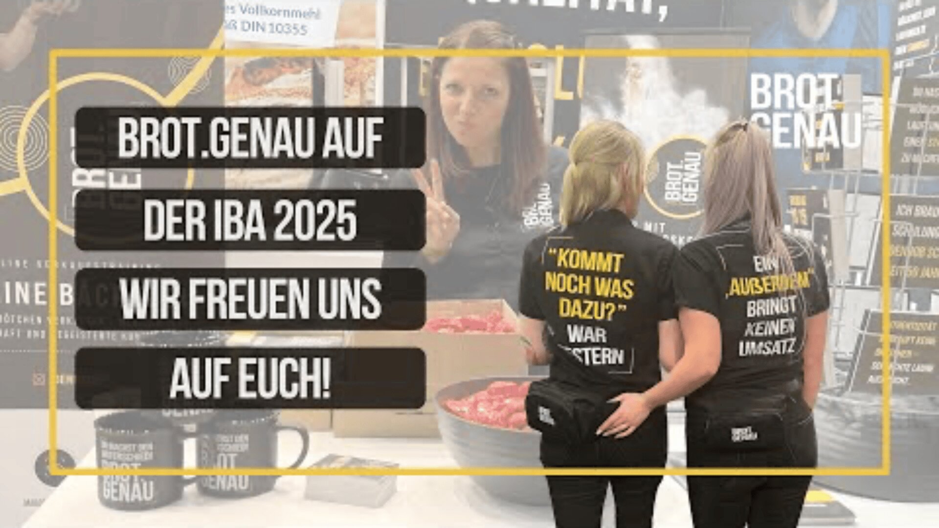 Two women with BROT GENAU shirts stand at a booth with mugs and bread, looking at a background poster of a woman eating. German text announces “BROT.GENAU at IBA 2025. We look forward to seeing you!”.