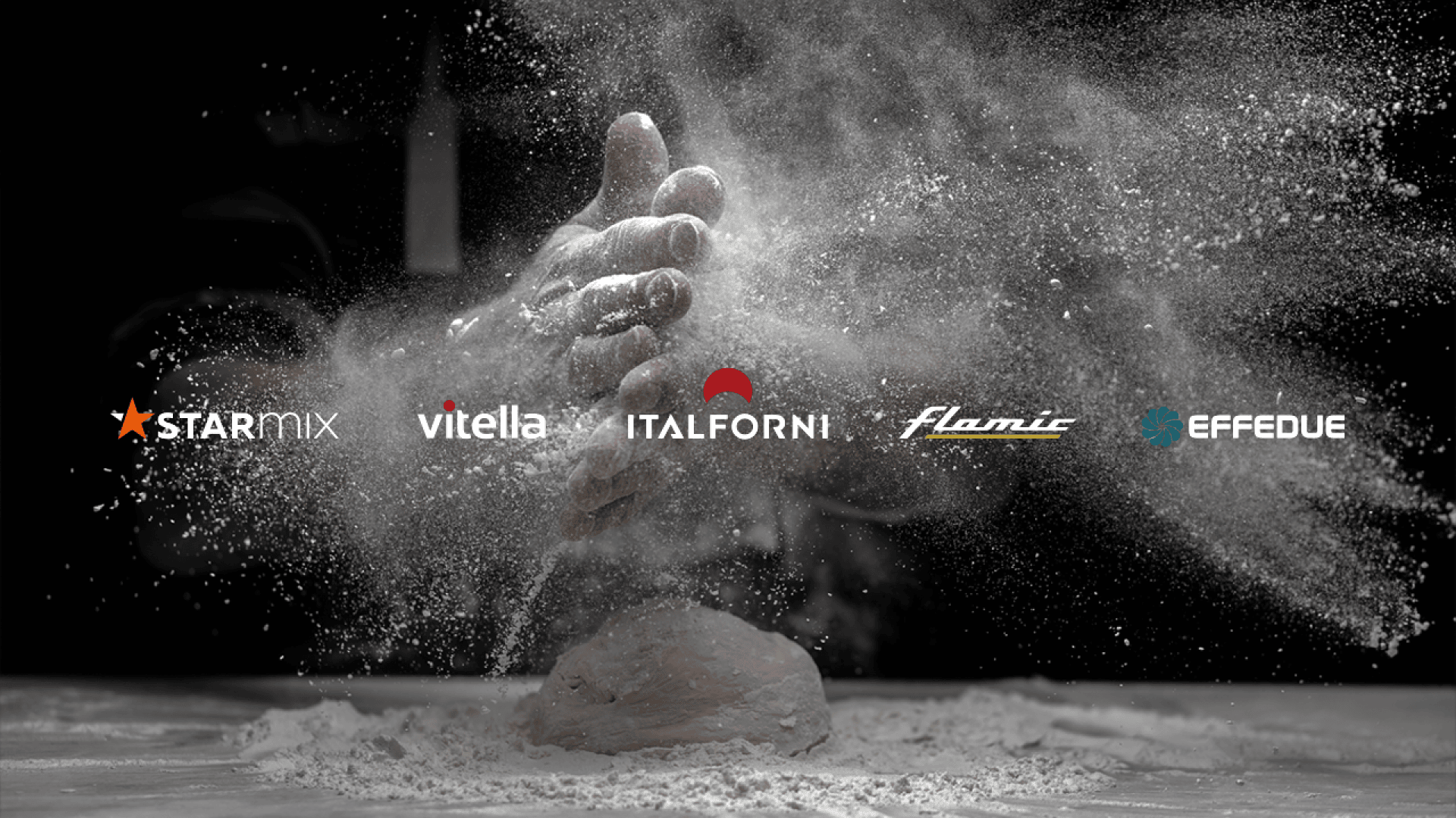 A pair of hands claps above a ball of dough, creating a cloud of flour. Logos for Starmix, Vitella, Italforni, Flamic, and Effedue appear across the center of the image.