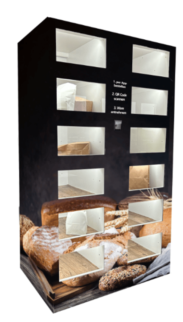Ein schwarzer, rechteckiger Verkaufsautomat mit transparenten Fächern, in denen verschiedene Brotsorten angeboten werden. Auf der Vorderseite sind Anweisungen und ein QR-Code-Leser zu sehen. Der Automat ist im unteren Bereich mit Bildern von Brot verziert.