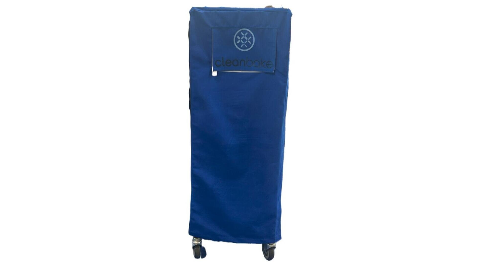A tall, rectangular cart covered with a fitted blue fabric cover labeled cleanbake, standing on four caster wheels against a white background.