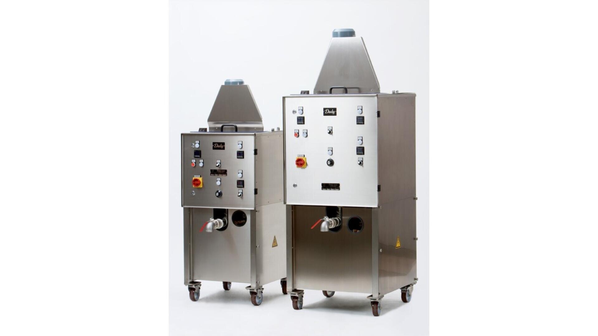 Two stainless steel industrial machines with control panels, buttons, switches, and indicator lights, each on wheels and equipped with cone-shaped exhaust vents on top, set against a plain white background.