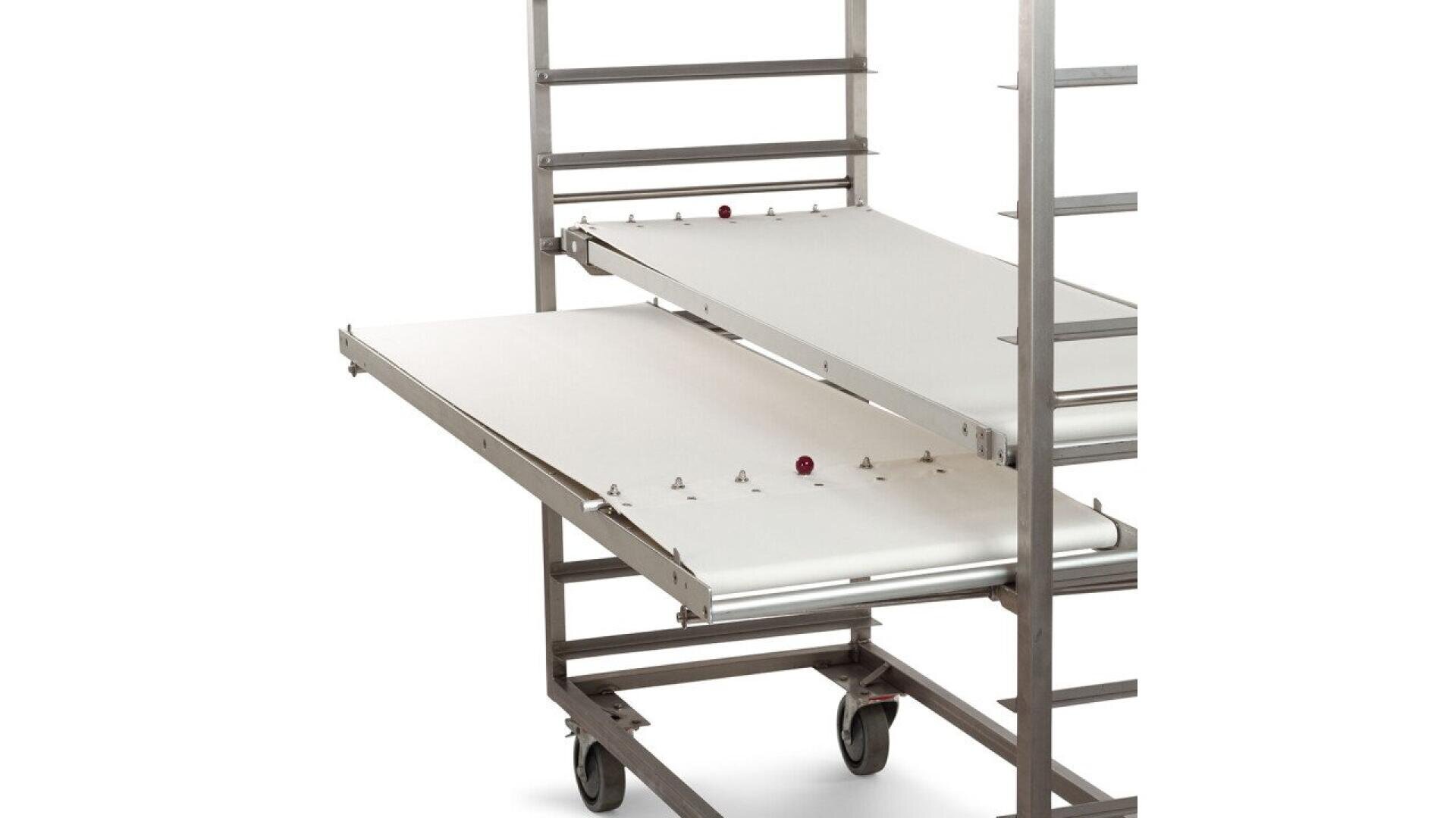 A stainless steel bakery trolley with sliding, flat, white trays and caster wheels, designed for holding or transporting baked goods in an industrial or commercial kitchen.
