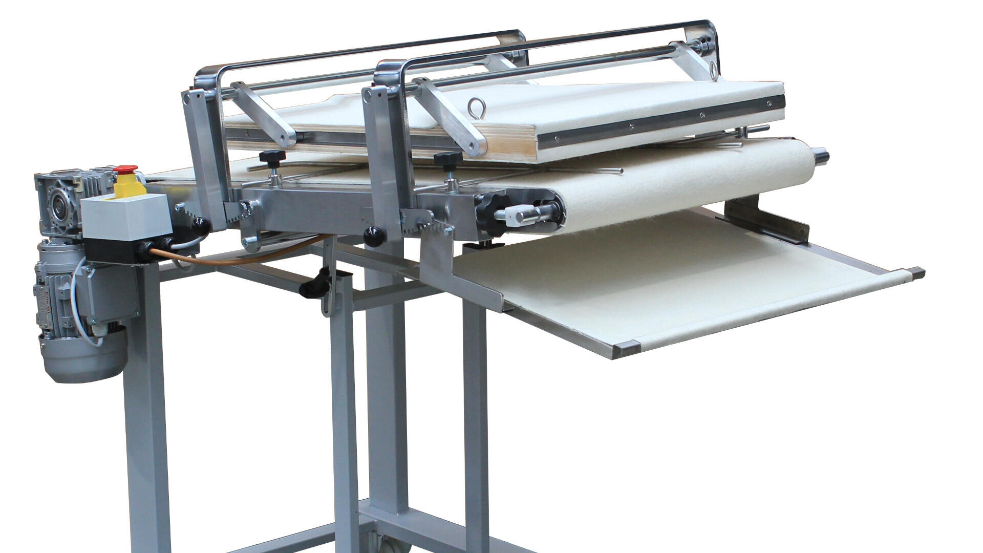 A commercial dough sheeter machine made of metal, with rollers and a conveyor belt, used for flattening dough in bakeries or food production settings.