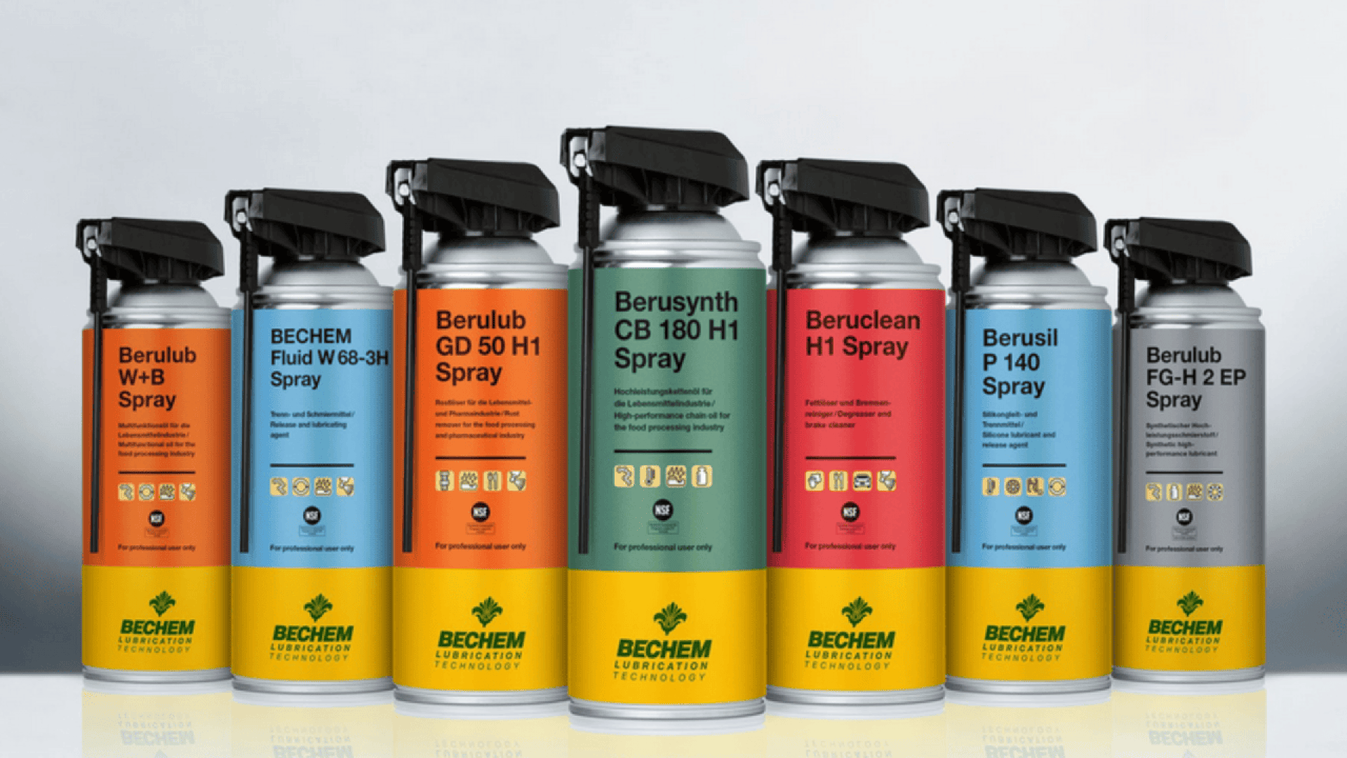 Seven cans of BECHEM spray lubricants in different colors stand upright in a row, each labeled with a different product name, against a light background.