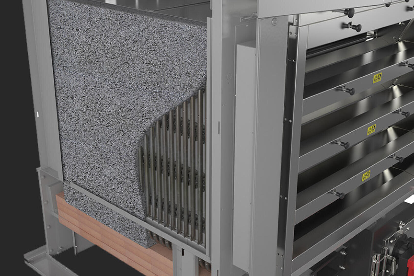 A close-up of an industrial air handling unit shows a section of exposed insulation material, metal fins, and several horizontal panels with yellow labels, revealing part of the unit’s internal structure.