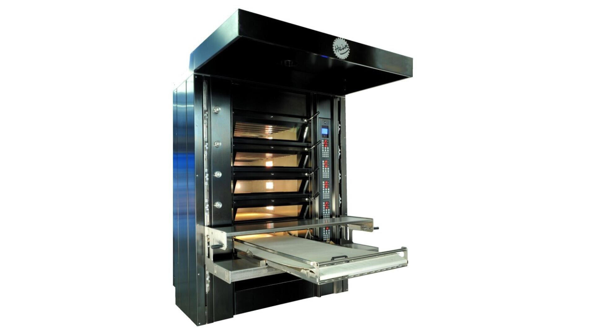 A large commercial bakery oven with multiple stacked baking chambers, control panels on the side, and an extended open tray for loading and unloading baked goods.