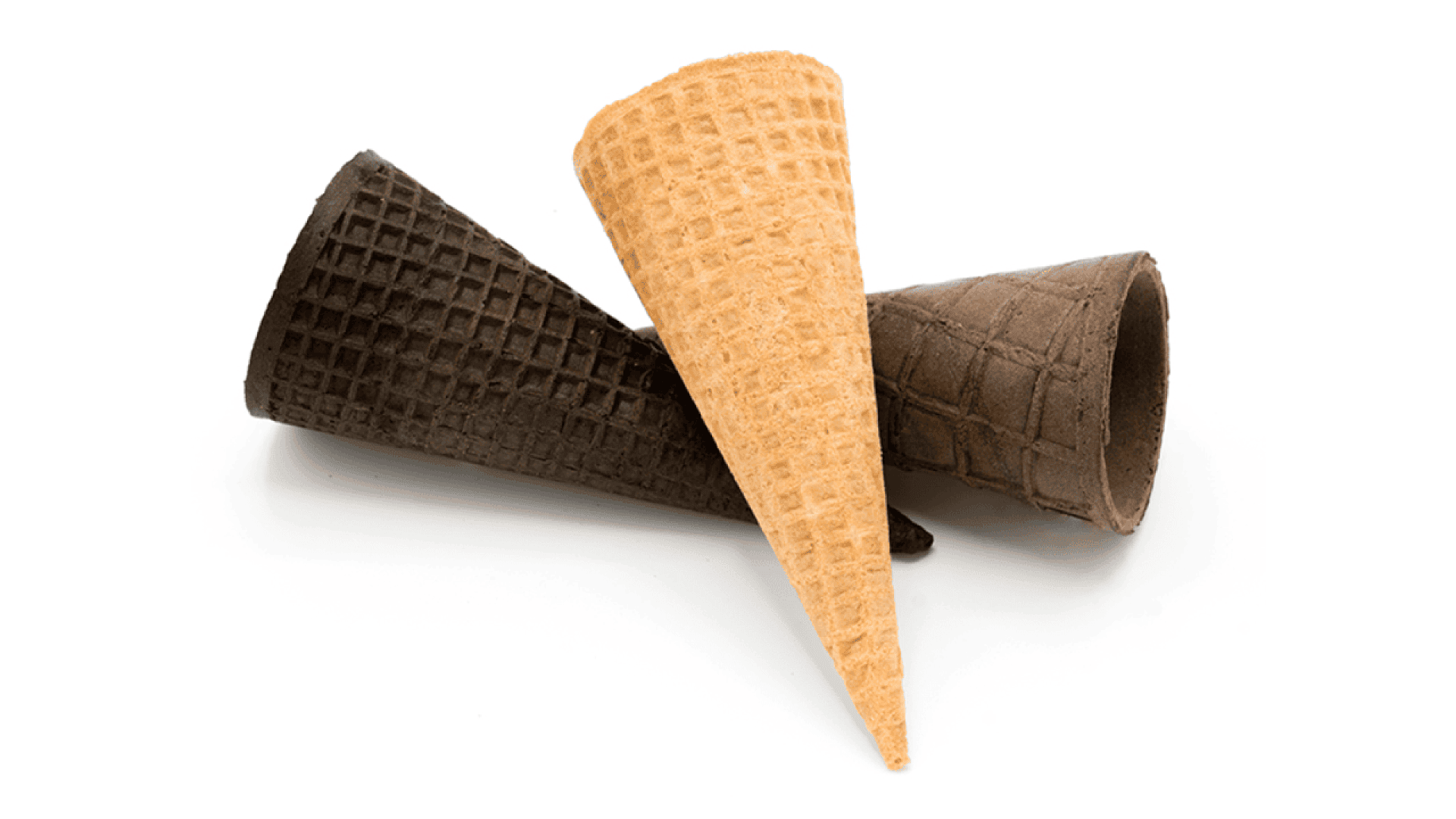 Three empty waffle ice cream cones, two chocolate and one vanilla, are arranged on a white background, overlapping each other in a casual, slightly angled stack.