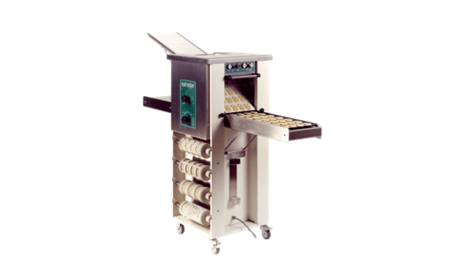 A commercial dough and cookie forming machine with a conveyor belt, control panel, and multiple roller attachments on the side, used for shaping and producing baked goods.