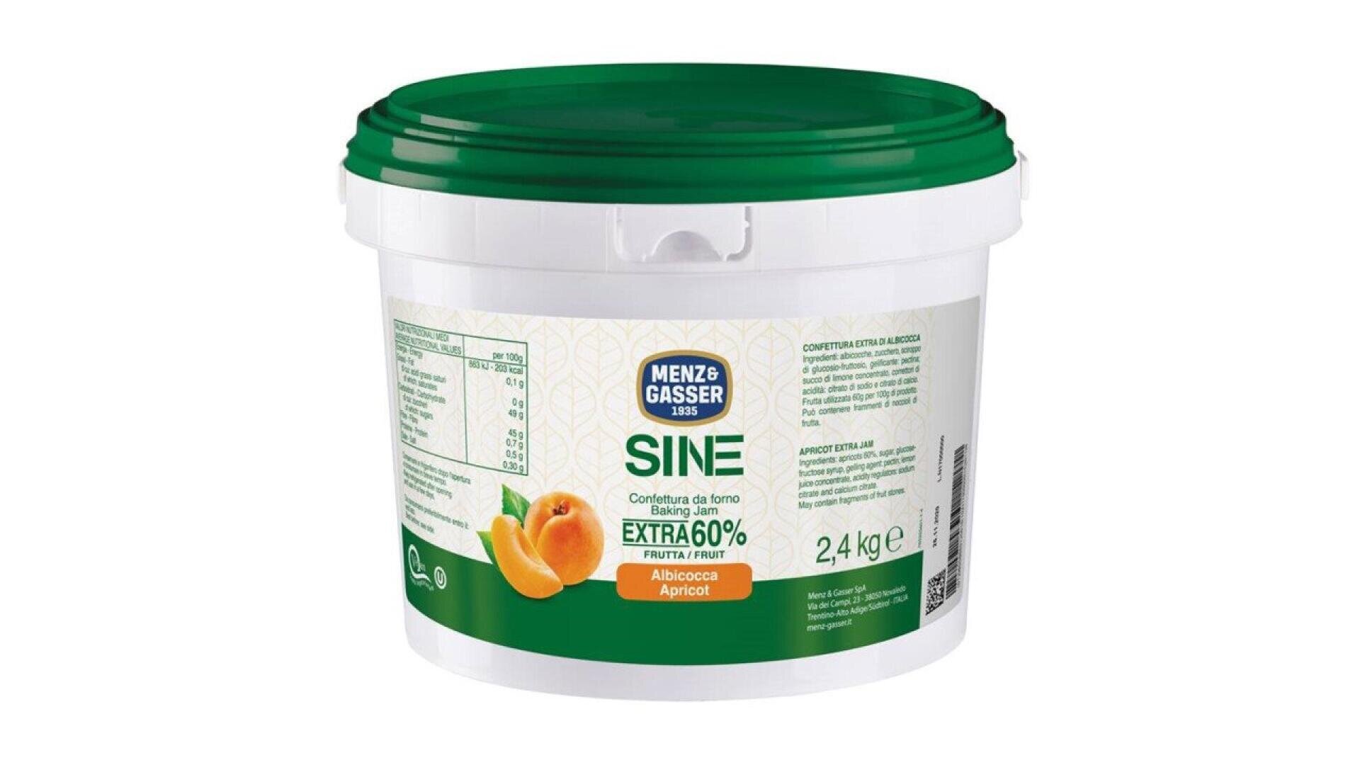 A white plastic tub with a green lid labeled Menz & Gasser Sine Extra 60% Apricot, featuring images of apricots. The container holds 2.4 kg of apricot fruit filling or jam.