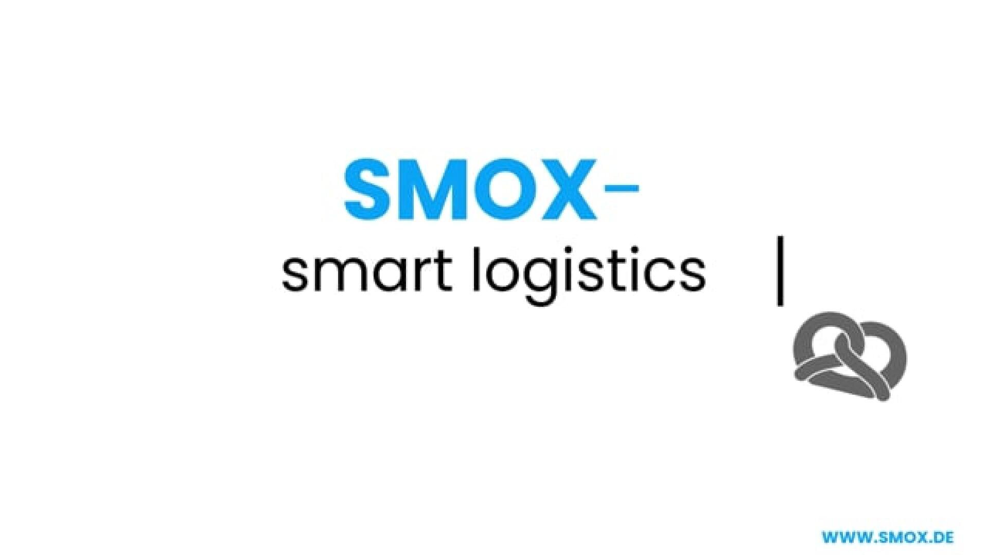 The image displays the text SMOX- smart logistics in blue and black font, accompanied by a gray icon of two interlocking links and the website www.smx.de in the bottom right corner.
