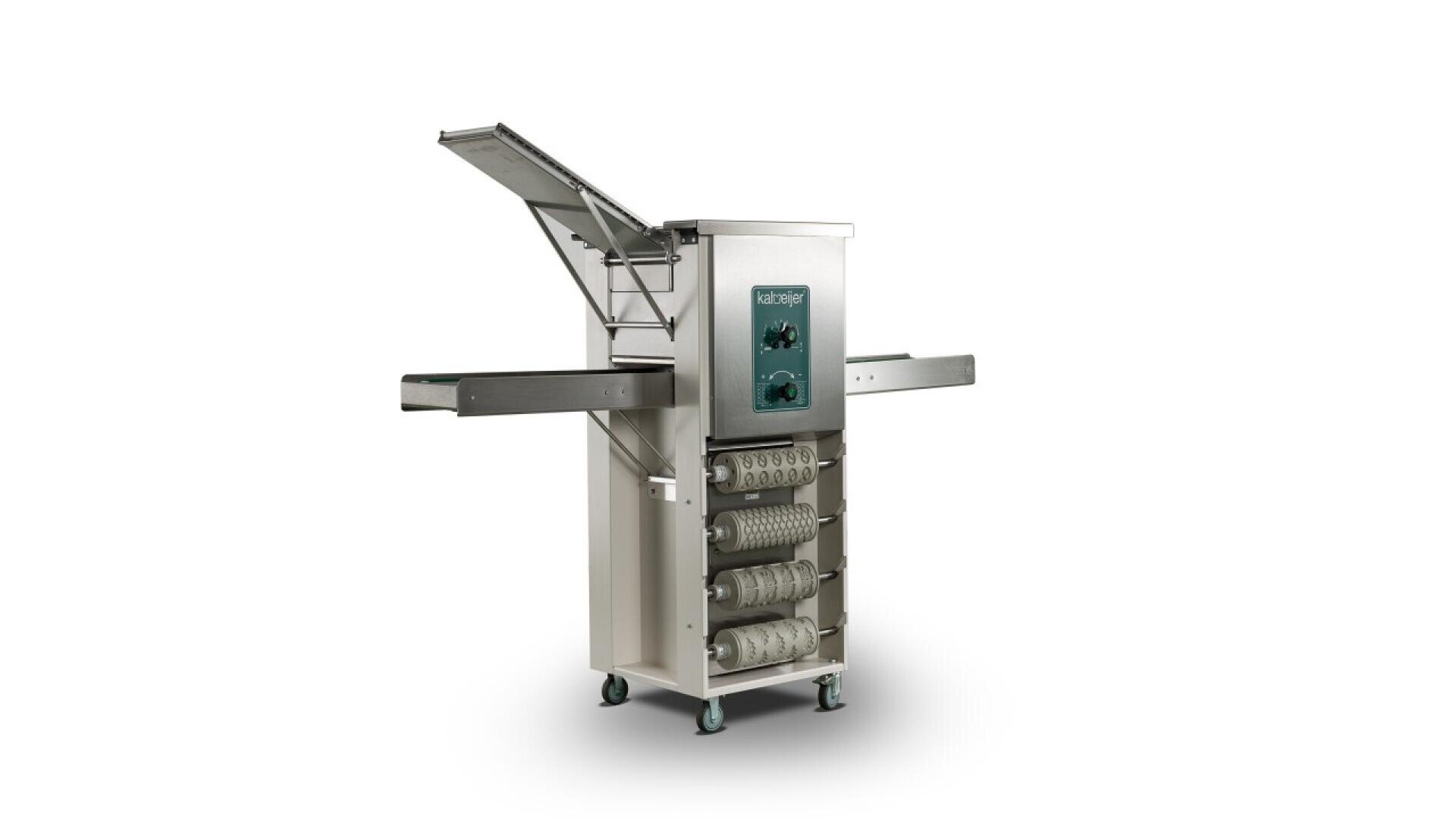 A commercial dough sheeter machine with a metal body, conveyor belts on either side, an angled feeding tray, control panel, and rollers; positioned on caster wheels against a white background.