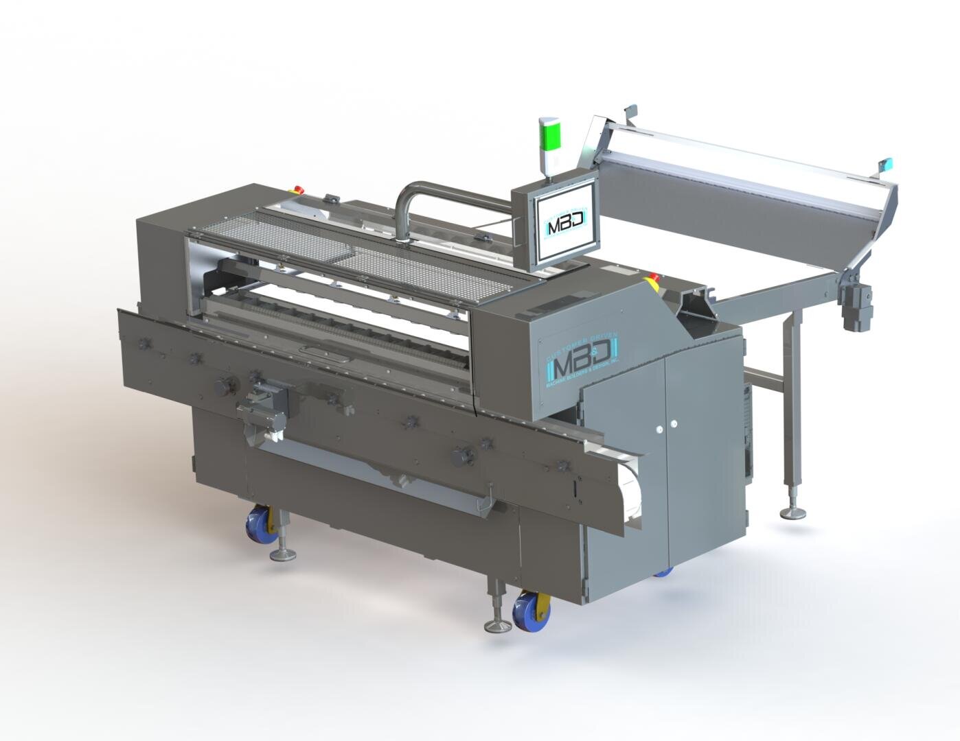 A large industrial machine with a conveyor belt, control panel, and safety guard, featuring MBI branding. The machine stands on wheels and has indicator lights and a metal frame.